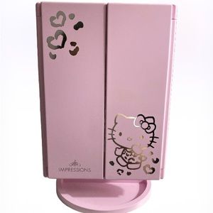 Trifold mirror. Pink hello kitty impressions